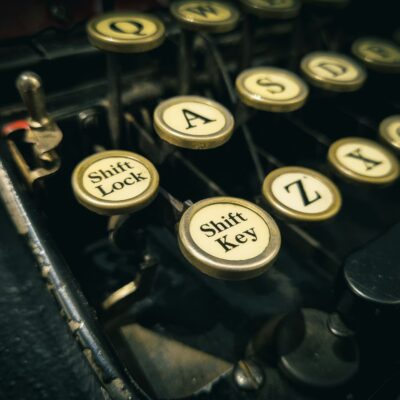 Vintage typewriter symbolizing historical research for paranormal investigations.