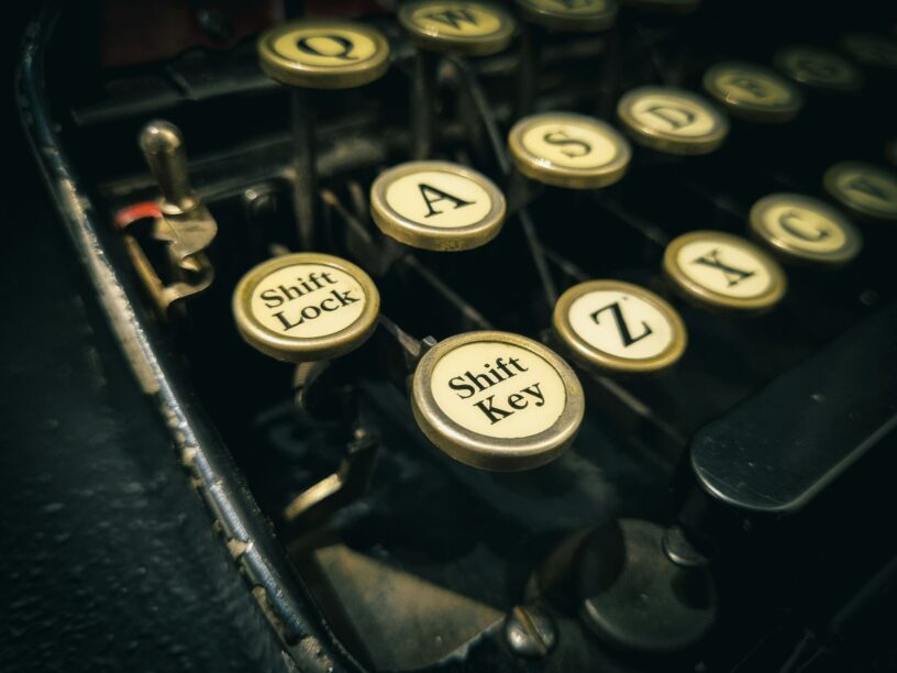 Vintage typewriter symbolizing historical research for paranormal investigations.