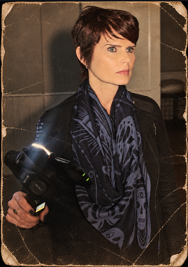 Carrie Genzel holding paranormal investigation equipment during an Echoes of the South investigation