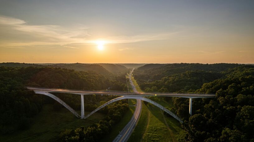 Natchez Trace Parkway winding through the Mississippi landscape at sunset