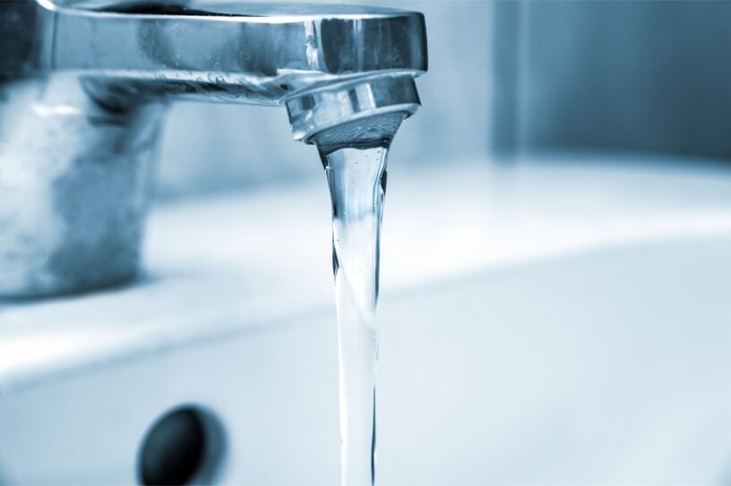 Water running from a bathroom faucet