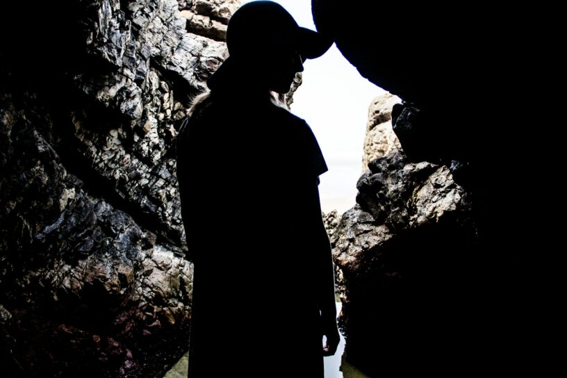 Visitor exploring Bell Witch Cave in Adams, Tennessee